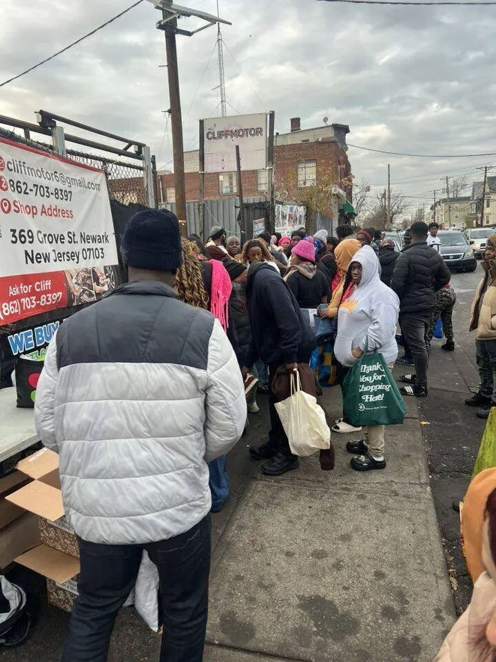 Community members in line for help