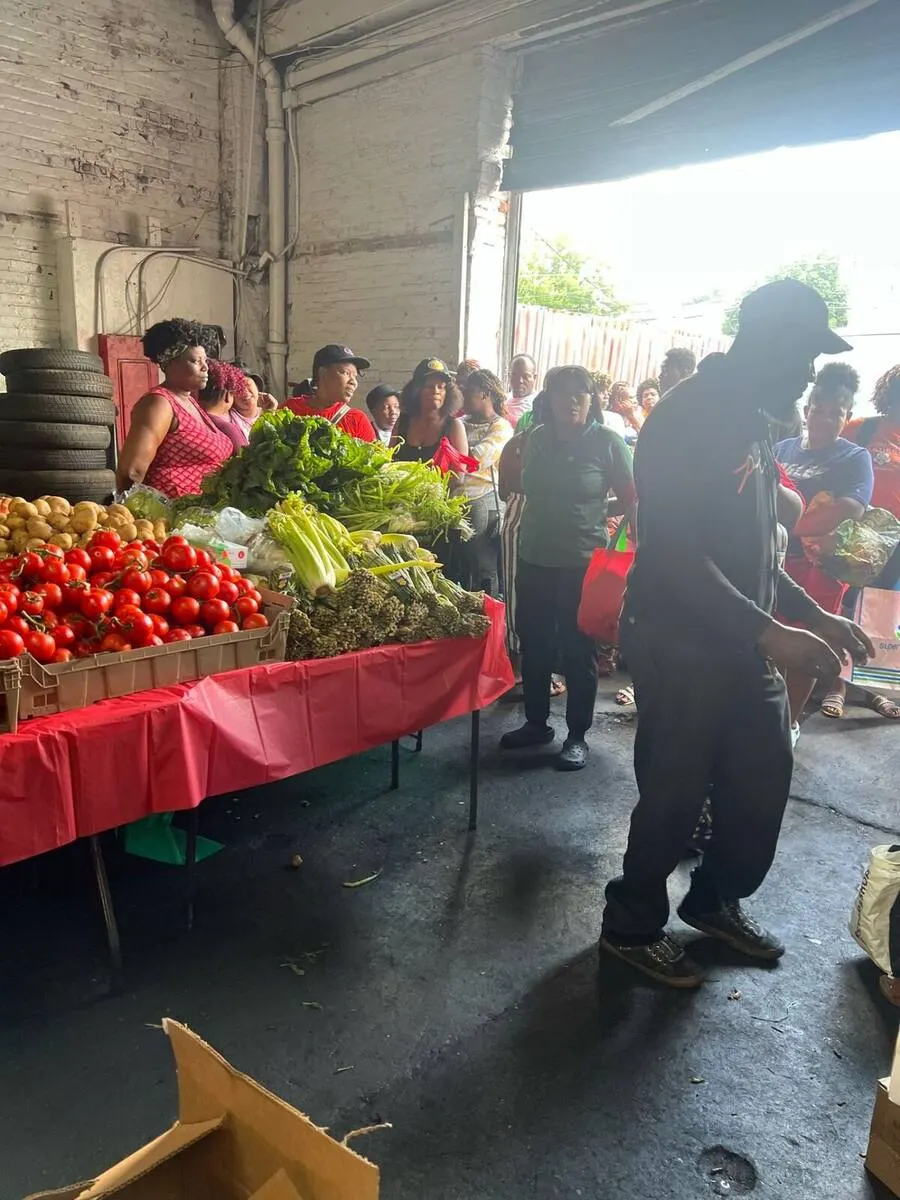 Tables loaded with tomatoes and fresh greens